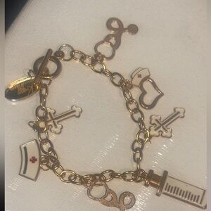 Krissy Marie nurse themed charm bracelet Gold toned Medical Charm Bracelet